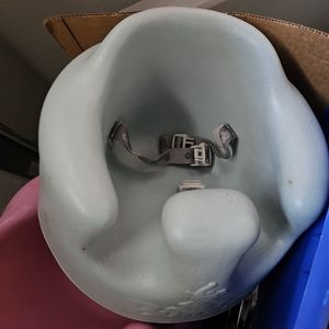 Bumbo with seat belt